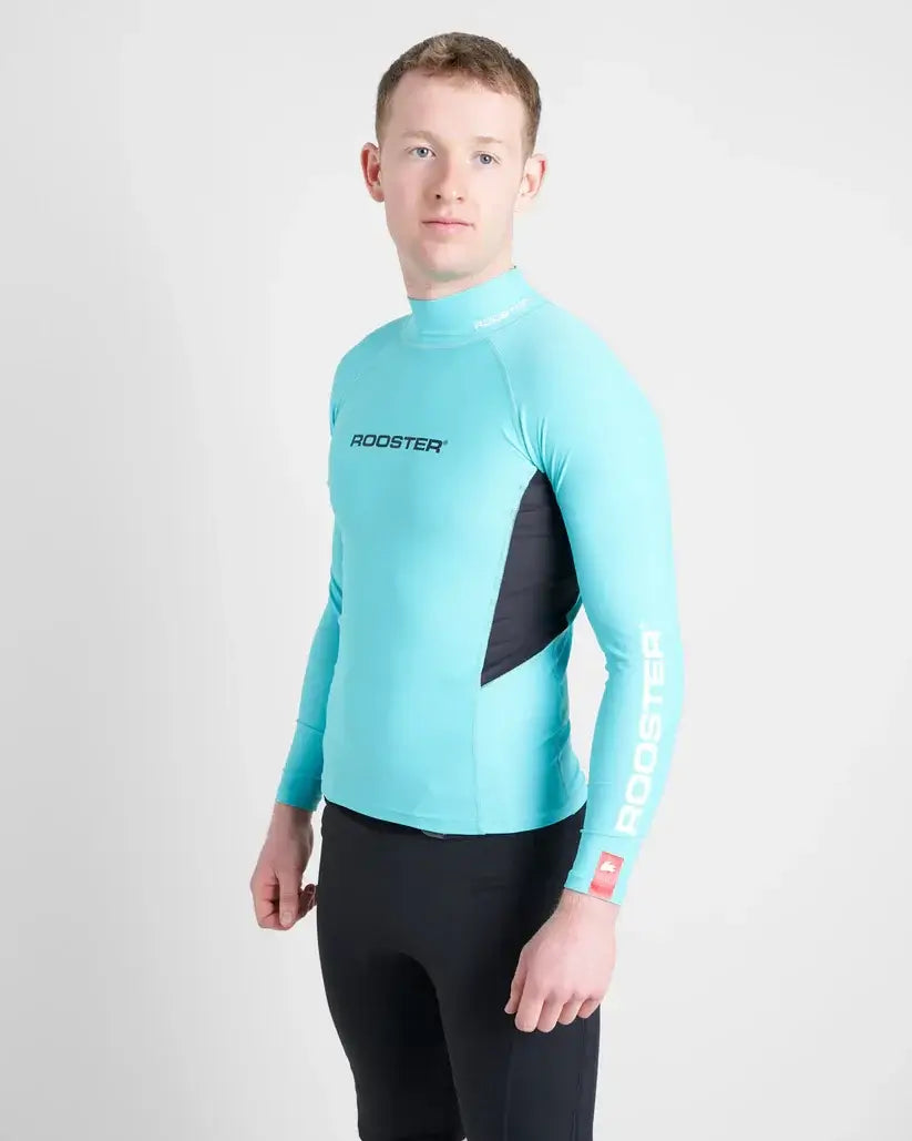 Rash Top-Long Sleeved de Rooster, haut technique anti-UV, couleur turquoise et noir, idéal pour activités nautiques.