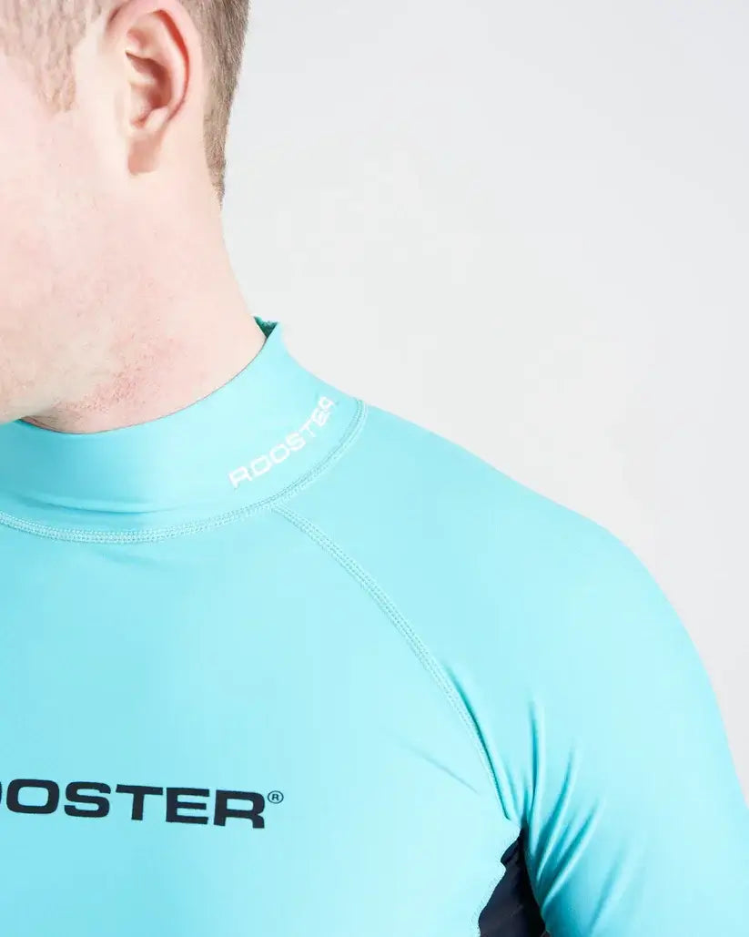 Rash Top-Long Sleeved: Haut technique Rooster en lycra spandex, protection anti-UV, idéal pour activités nautiques.