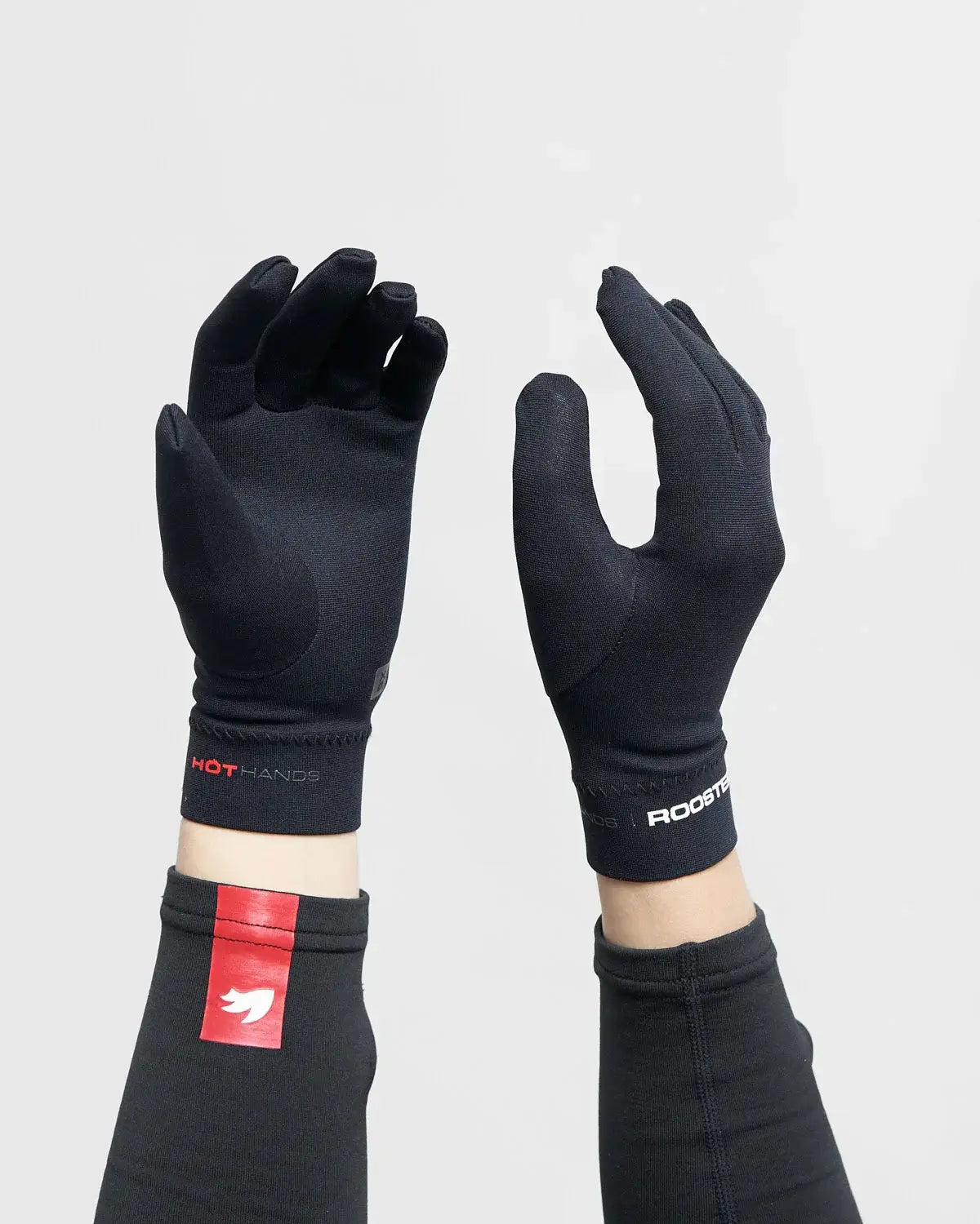 Sous gants néoprène 0.5mm Rooster montrant le design minimaliste et technique pour une isolation thermique.
