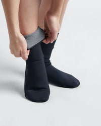 Chaussettes Supertherm Wet Socks 4mm Neoprene en néoprène, ajustement sur pied, confort pour activités nautiques.