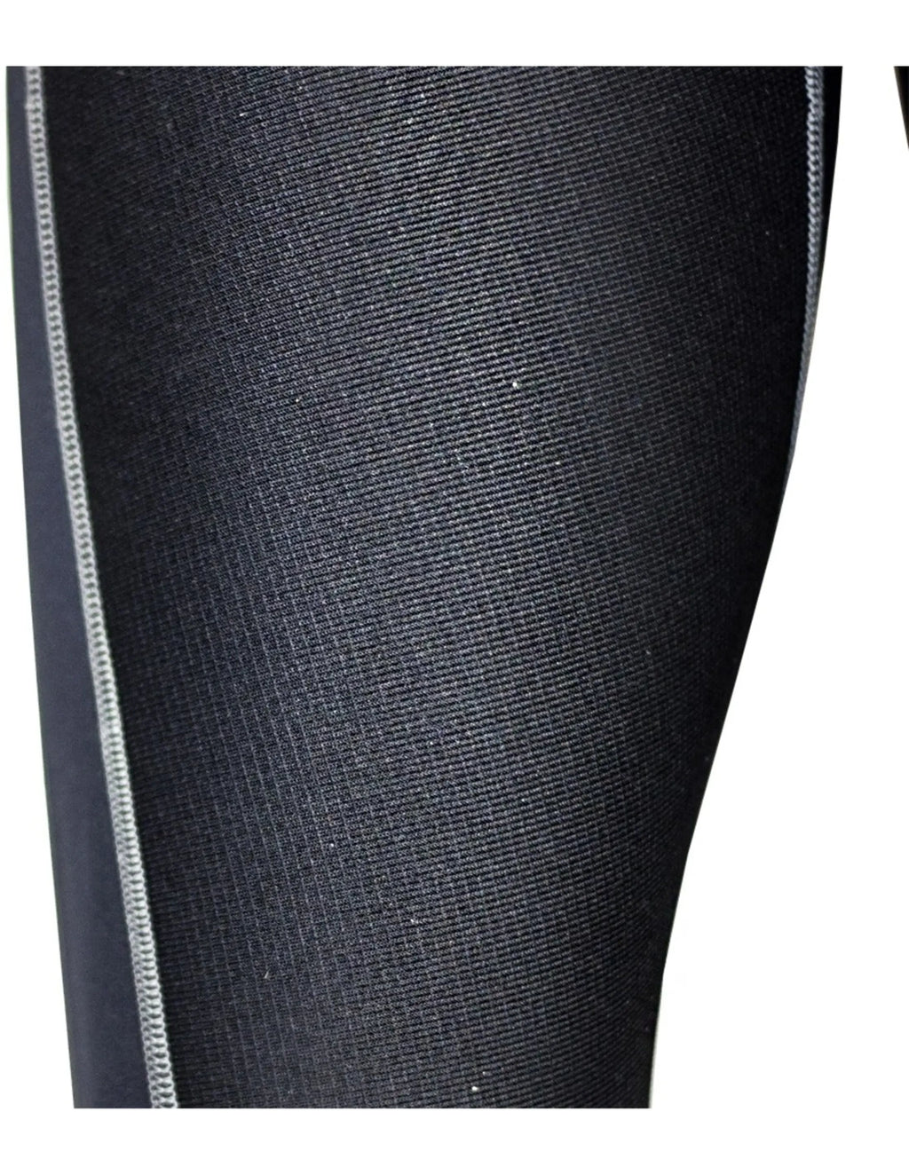 Détail de la combinaison long jane 3mm fille, tissu néoprène avec texture réfléchissante.