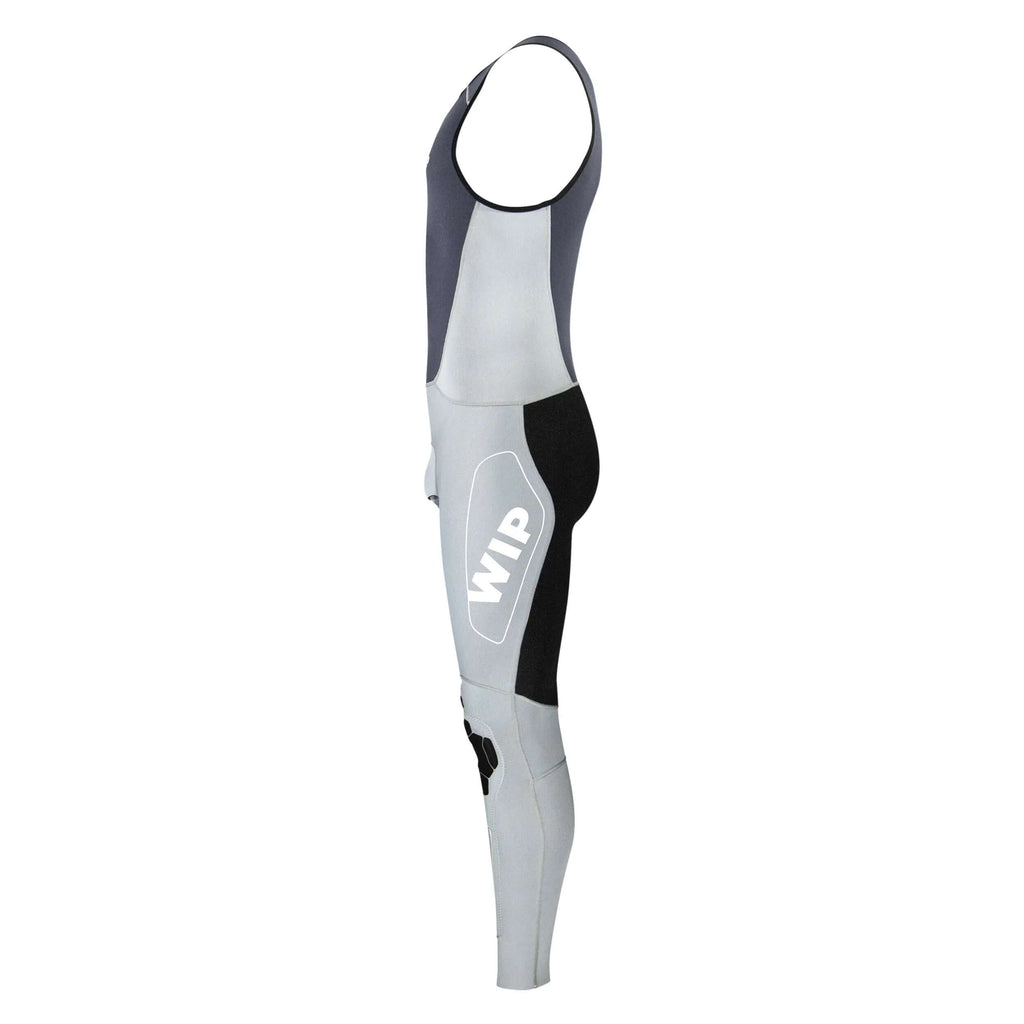 Combinaison néoprène longue été homme vue de profil, en néoprène airprene perforé pour confort et mobilité.