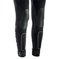 Détails de la combinaison néoprène femme été, axée sur flexibilité et protection avec panneaux anti-abrasion.