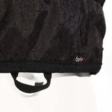 Gilet d'aide à la flottabilité IMPACT VEST 50N en tissu noir avec motif hexagonal.