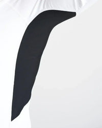Détail du Rash Top-Long Sleeved, montrant l'empiècement technique en lycra spandex pour protection UV.